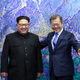 The two leaders speak prior to their summit meeting at the Peace House.